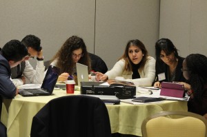 Delegates of the NGO committee read through each committee's draft resolution.
