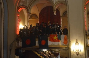 Waving flags during the closing ceremony of the HNMUN 2014 at the Boston Park Plaza.